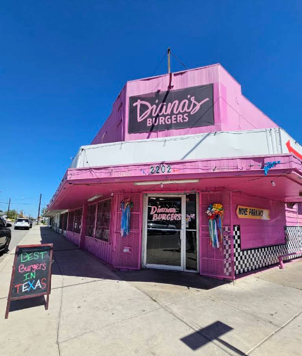 Diana's Burgers pink storefront with Best Burgers in Texas chalkboard